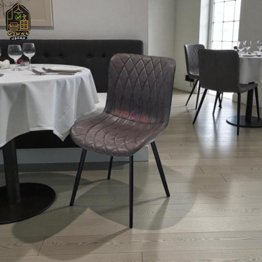 A dining table chair with a luxurious and elegant design that adds a touch of elegance to any place.