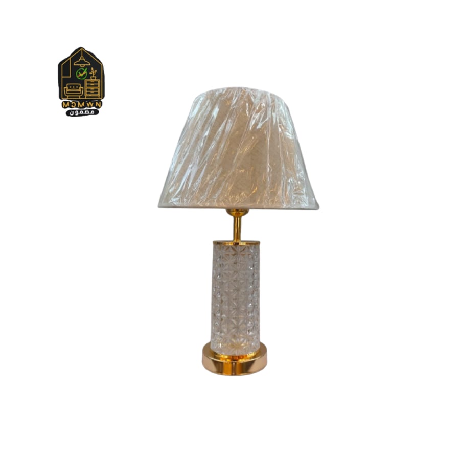 Luxury crystal table lamp with a gold base