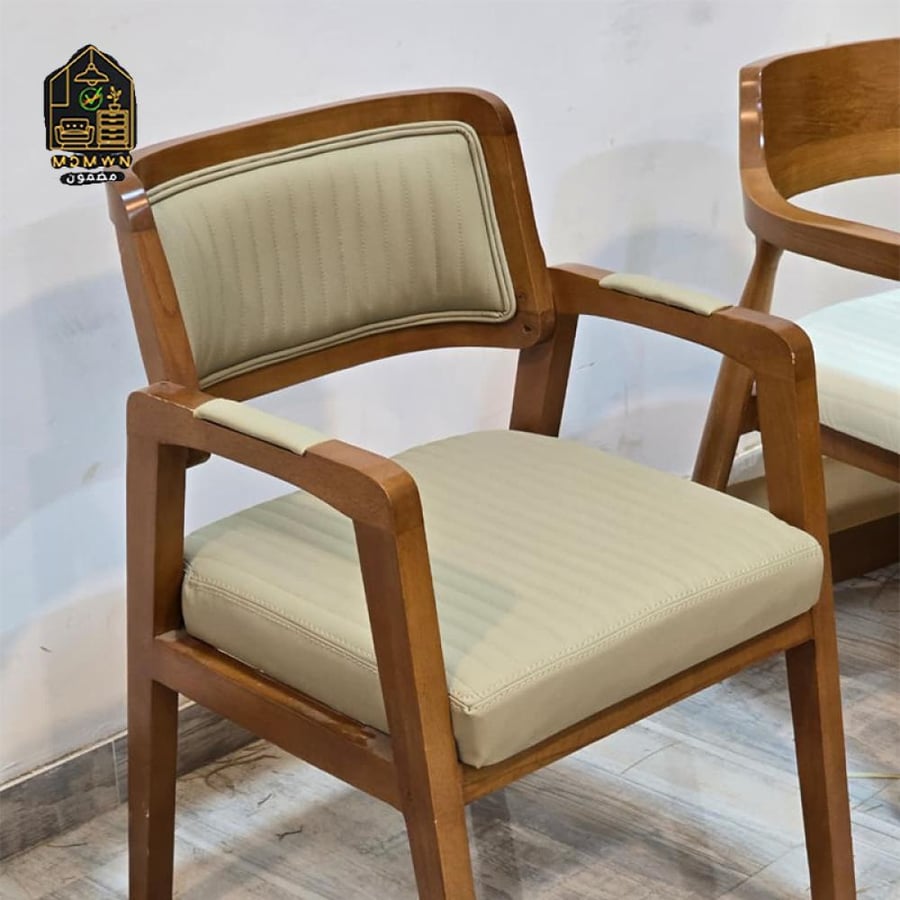 Modern wooden chair with padded seat and back