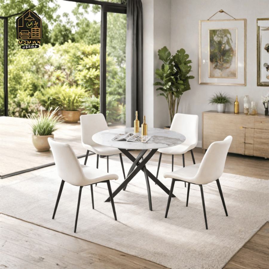 A modern dining table with chairs of various sizes.