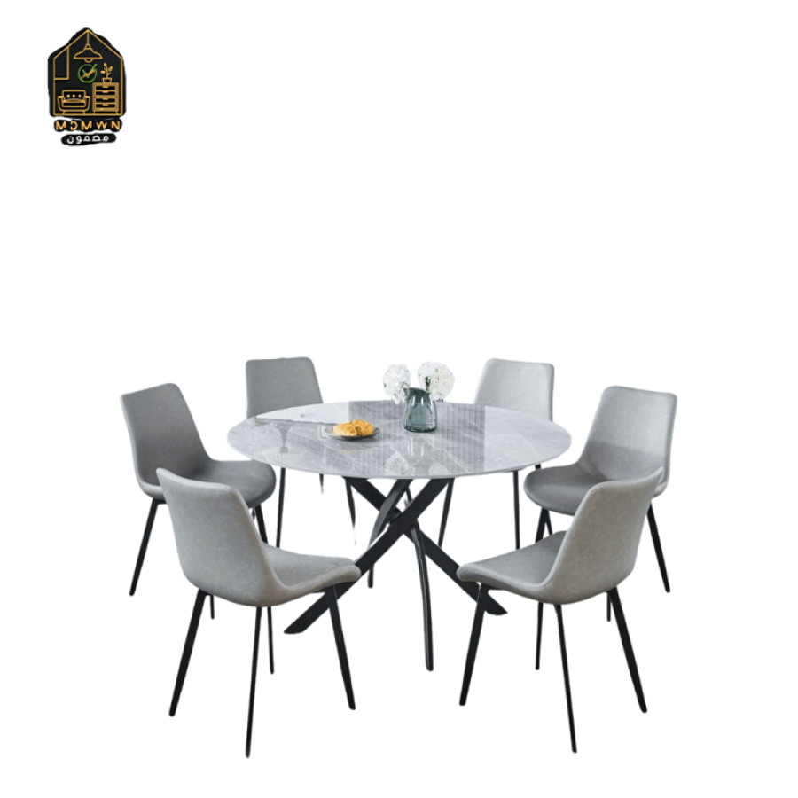 A modern dining table with chairs of various sizes.