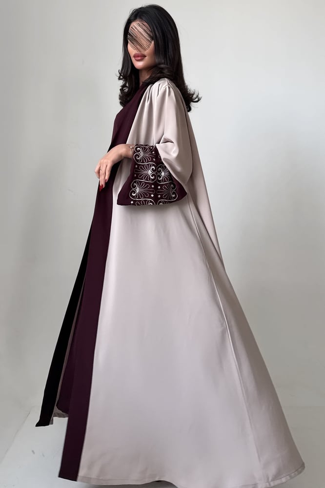 The embroidered abaya with dress