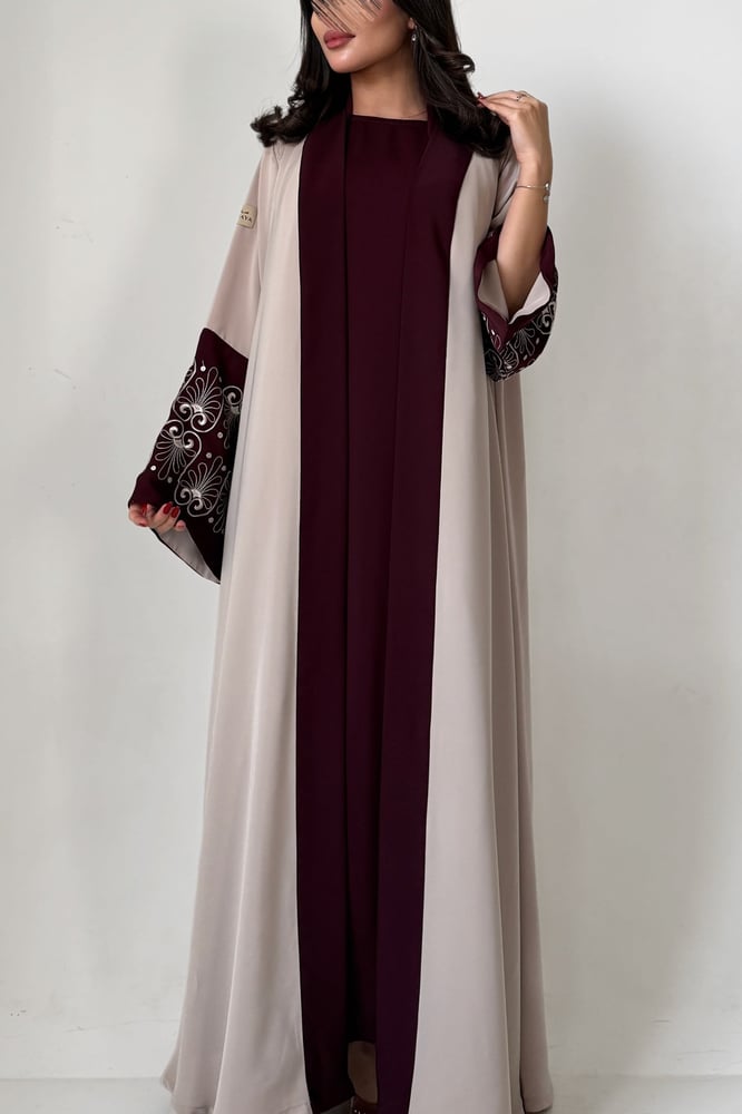 The embroidered abaya with dress