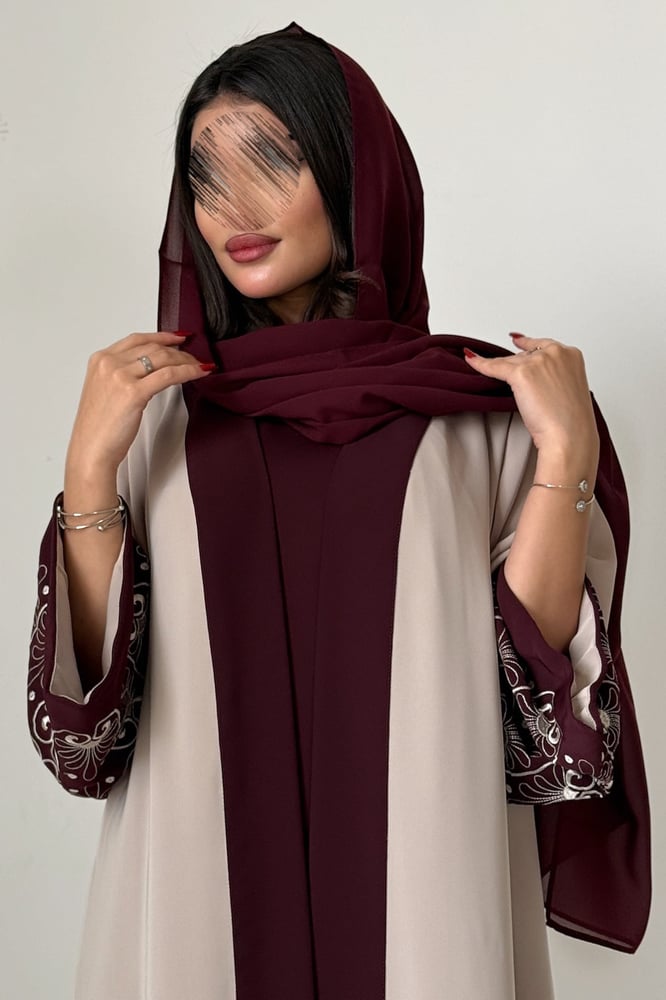 The embroidered abaya with dress