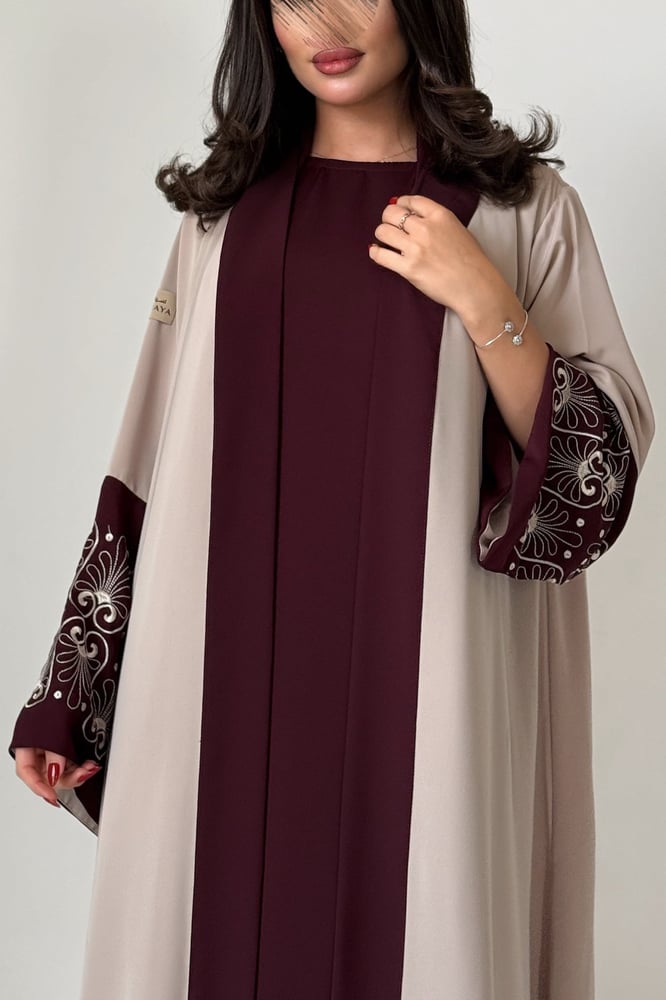 The embroidered abaya with dress