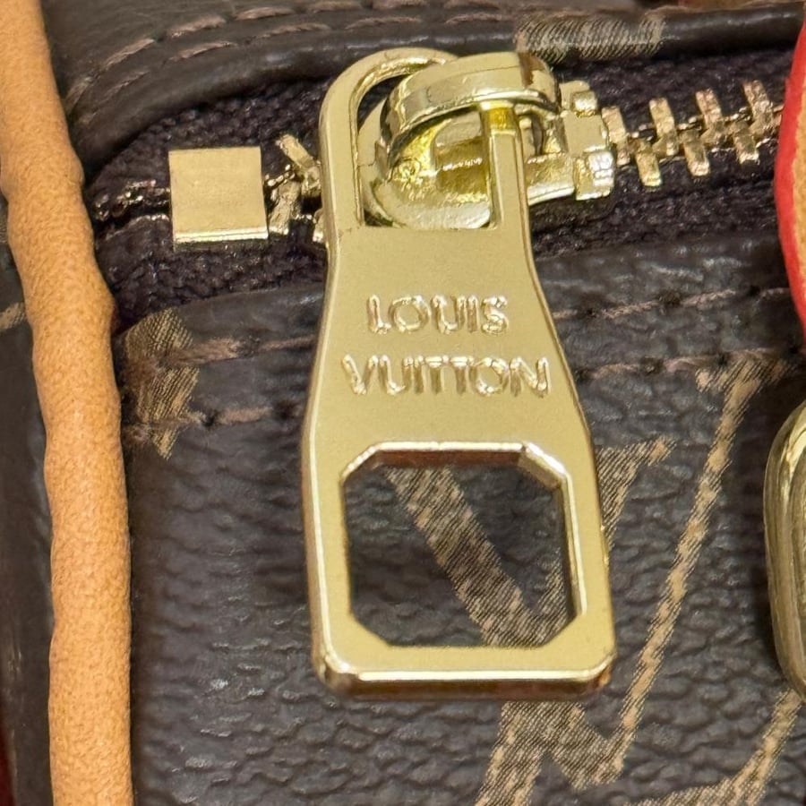 Louis Vuitton Nano Speedy bag with accessories and cherry medal