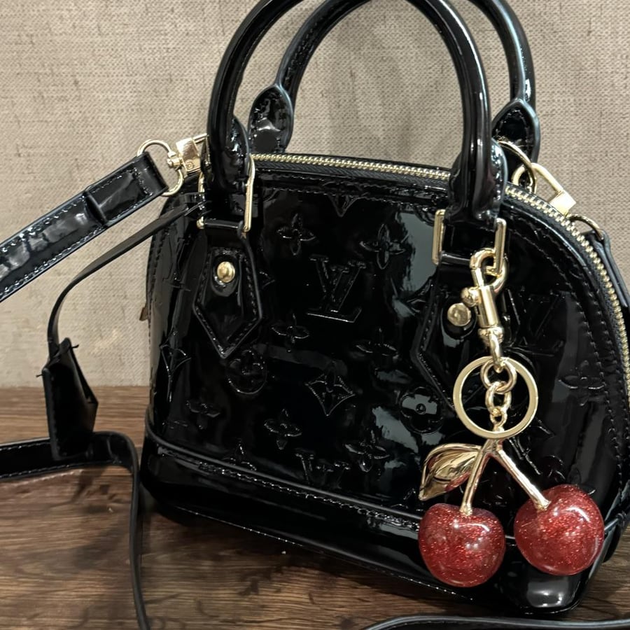 Louis Vuitton classic black with cherry medal