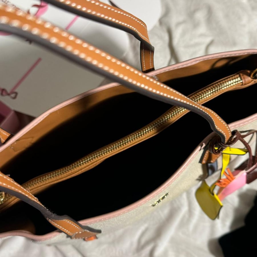 Colorful Tory Burch bag with the medal