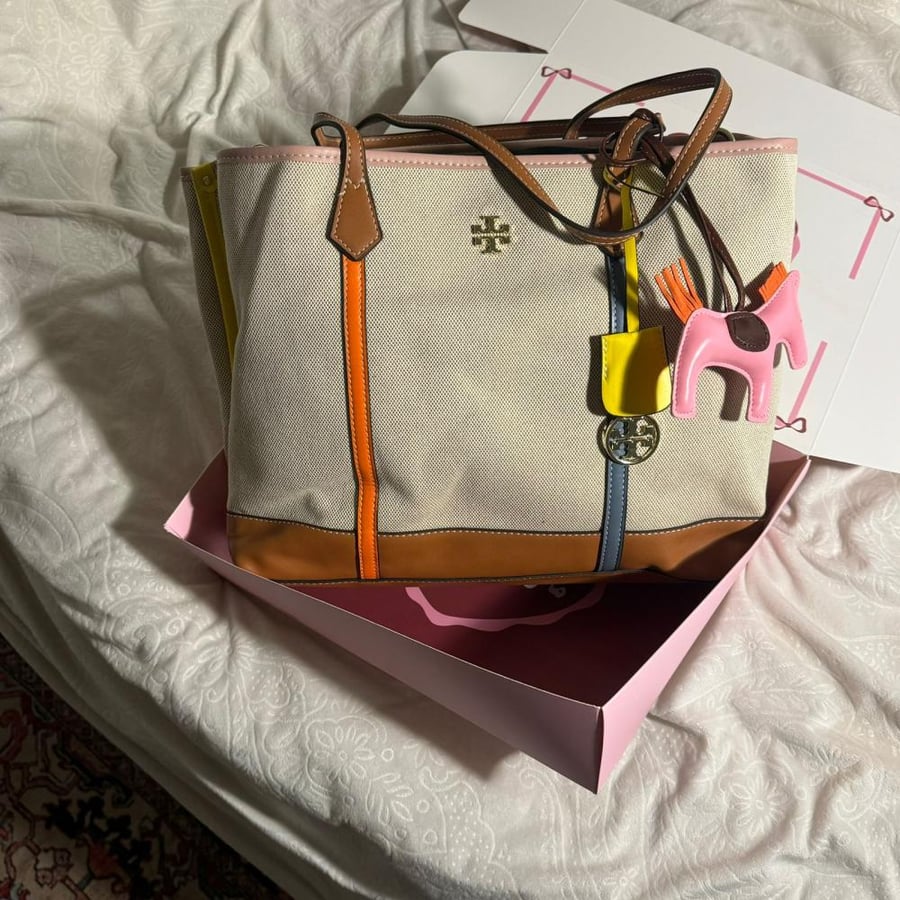 Colorful Tory Burch bag with the medal