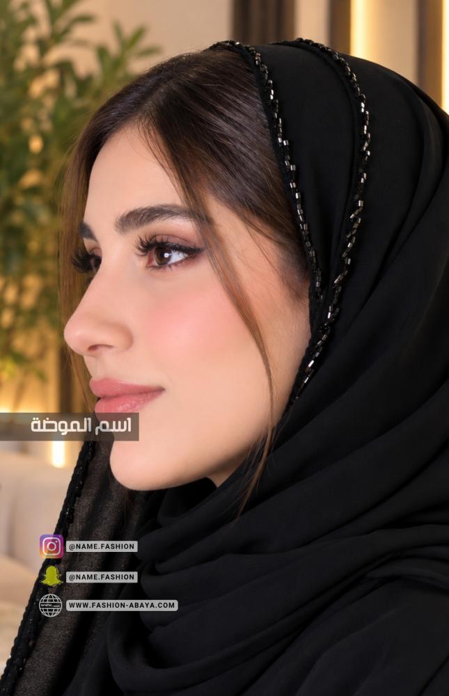 طرحه حرير سوداء مع شك اسود بالطرف