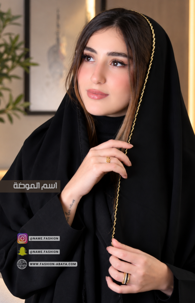 طرحه حرير سوداء مع شك ذهبي بالطرف