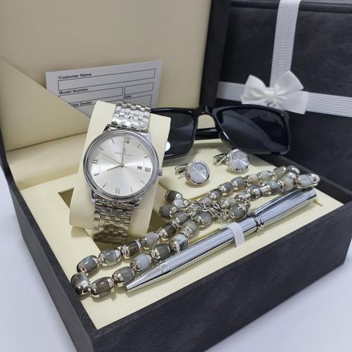 طقم رجالي ماركه اصلي بضمان سنه