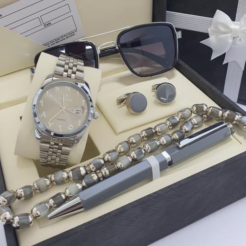 طقم رجالي ماركه اصلي بضمان سنه