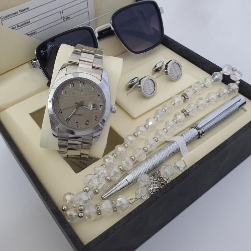 طقم رجالي ماركه اصلي بضمان سنه