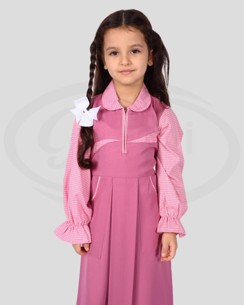 مريول مدرسي ابتدائي بتصميم كويتي وردي