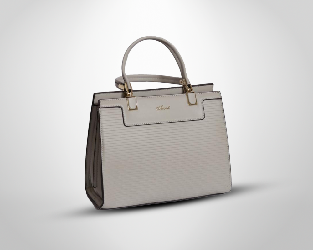شنطة يد حريمى وسط تجمع بين العصرية والفخامة في تصميم واحد - 38004 شنطة يد حريمى وسط تجمع بين العصرية والفخامة في تصميم واحد - 38004
