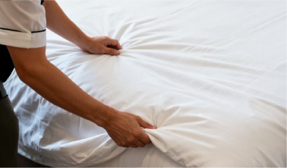 Why Do Hotels Tuck Sheets Under the Mattress?