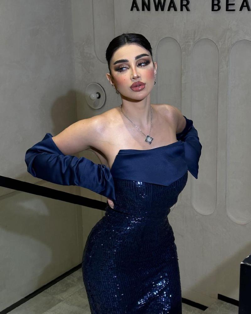 فستان سهرة كحلي كلفه ترتر