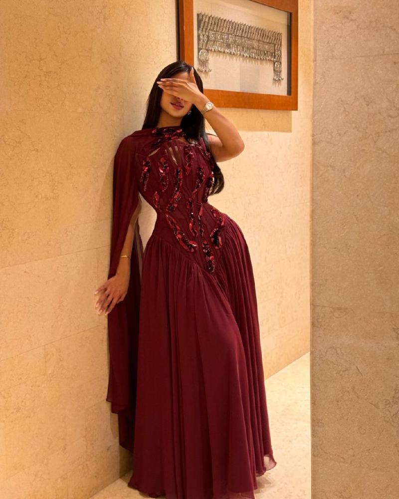 فستان سهرة عنابي تطريز صدر