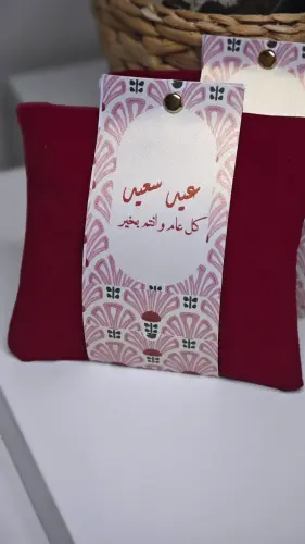 كيس مخملي مع حزام ورقي للعيد