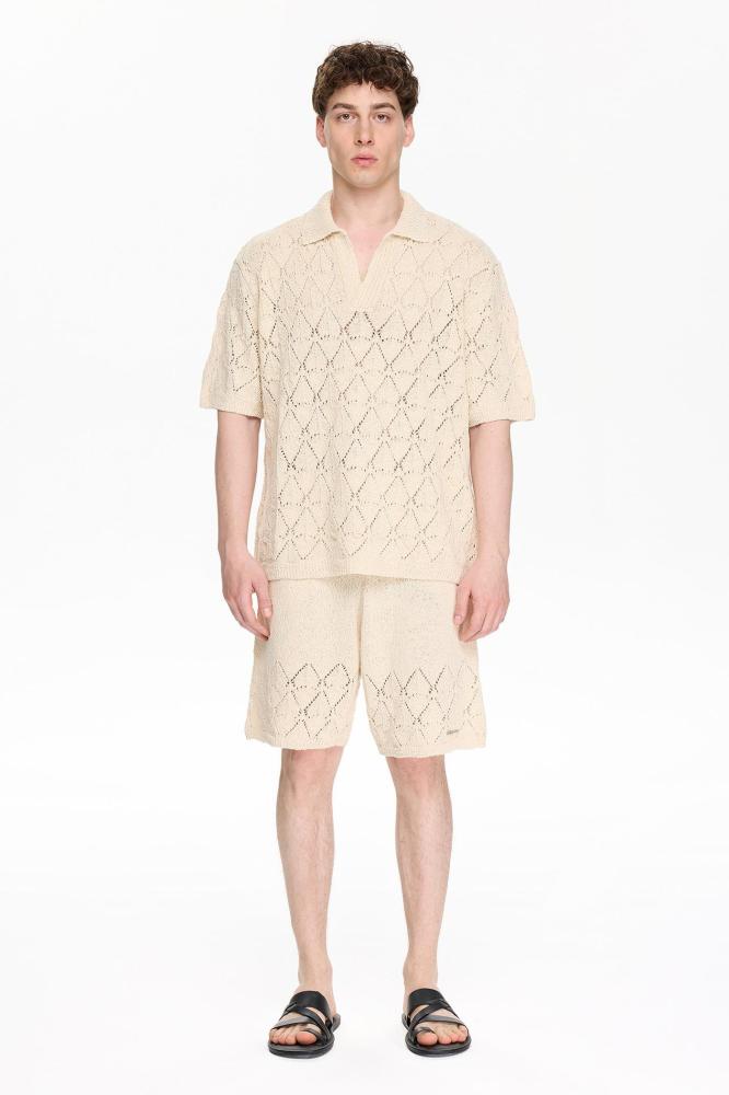 بلوفر رجالي بيج تريكو بأكمام قصيرة وقصة V