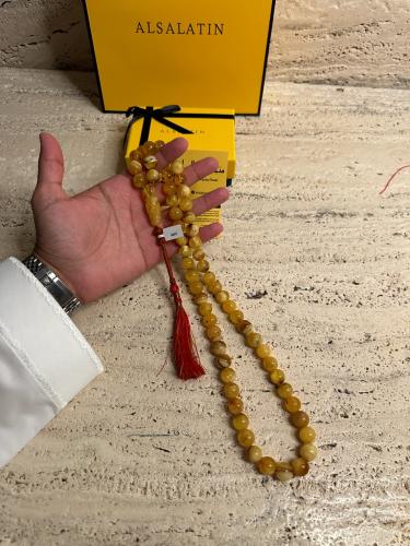 سبحه كهرمان حر حجم كبير شفاف مع  شوائب طبيعية