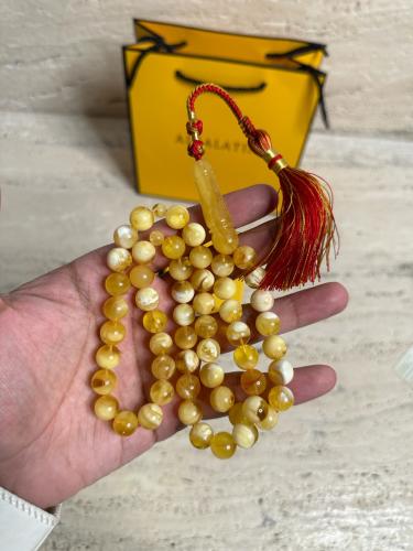 سبحه كهرمان حر شوائب طبيعية مع بياض