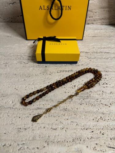 سبحة كهرمان حر  شوائب طبيعية مذهب مع شكة ذهبي