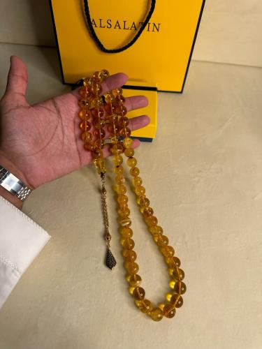 سبحه كهرمان حر حجم كبير شفاف مع  شوائب طبيعية