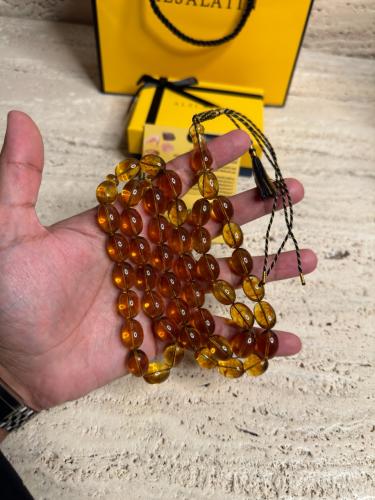 سبحه كهرمان حر شفاف  طبيعية قصة بيض حمام