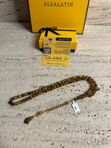 سبحه كهرمان حر شوائب طبيعية مع شكة استنلس استيل نفس المستخدمة في الساعات الفاخرة