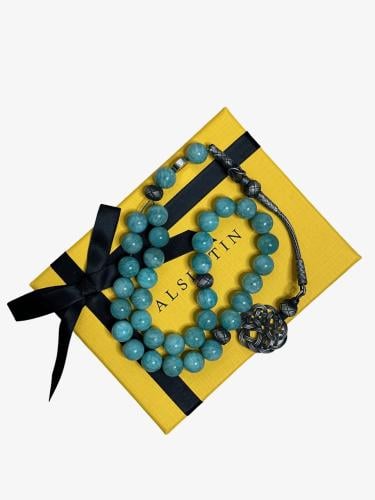 سبحة مصنوع من حجر الأمازونيت او الأمازون الطبيعي مع طربزونة  فضة عيار 925 وفواصل فضة عيار 925 حياكة يدوية و مشكوكه على ايدي امهر الحرفيين السعوديين