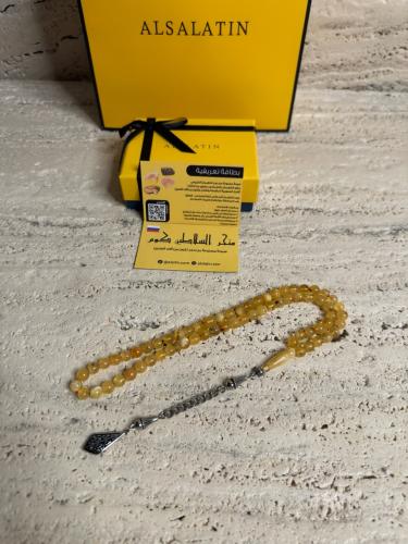 سبحه كهرمان حر شوائب طبيعية مع شكة استنلس استيل نفس المستخدم في الساعات الفاخرة