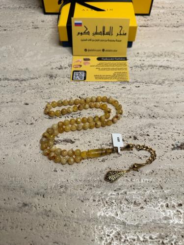 سبحه كهرمان حر شوائب طبيعية مع شكة استنلس استيل نفس المستخدم في الساعات الفاخرة