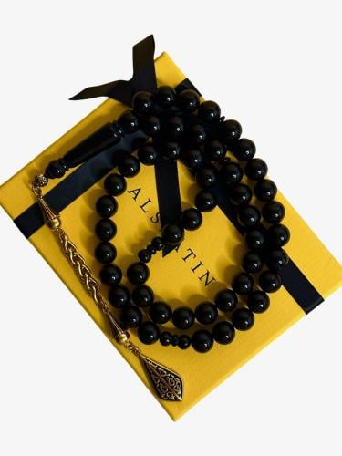 سبحة  بكلايت اسود  مع شكة ذهبيه من استنلس استيل نفس المستخدم في الساعات الفاخرة