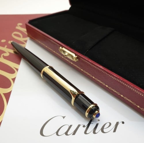 قلم ماركة كارتير اسود وذهبي كامل