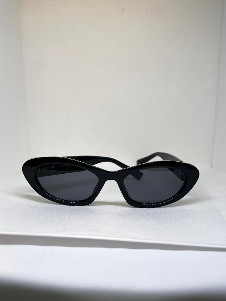 نظارة miu miu إطار أسود - عدسة أسود