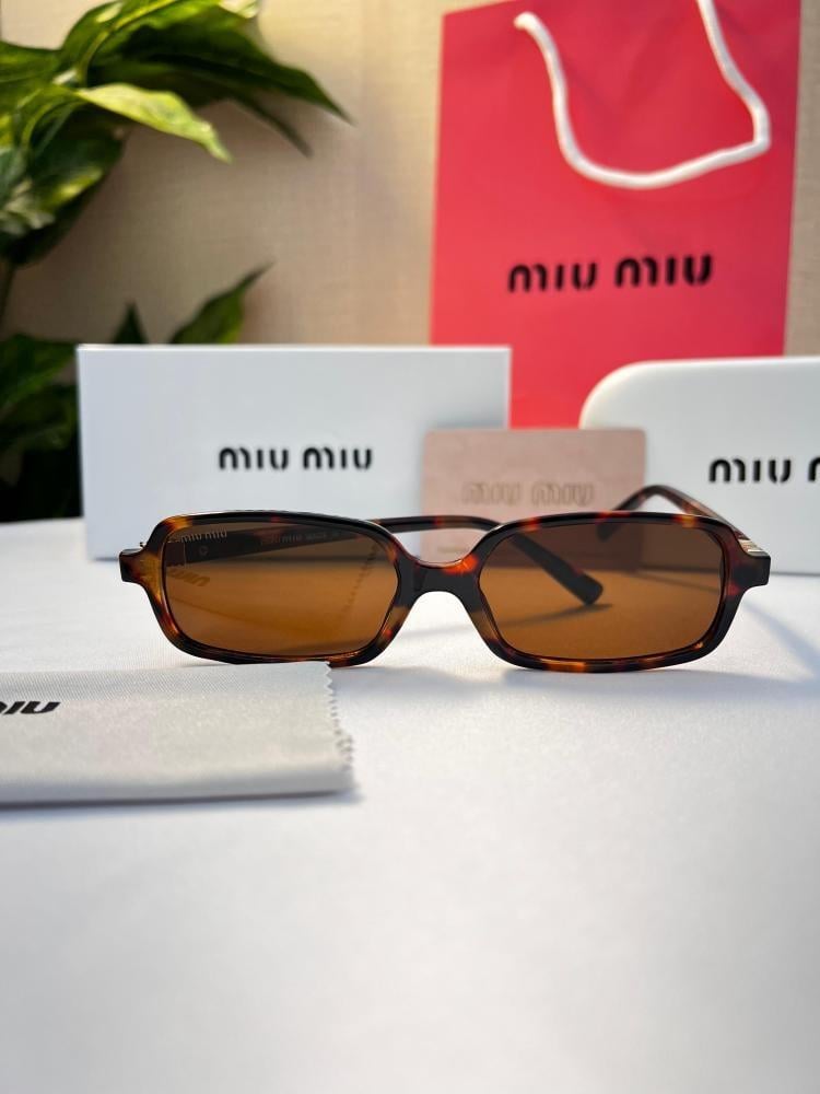 نظارة  miu miu- إطار بني - عدسة بني مدرج