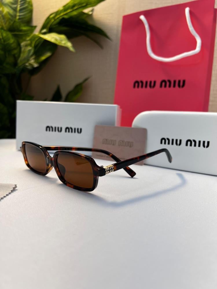 نظارة  miu miu- إطار بني - عدسة بني مدرج