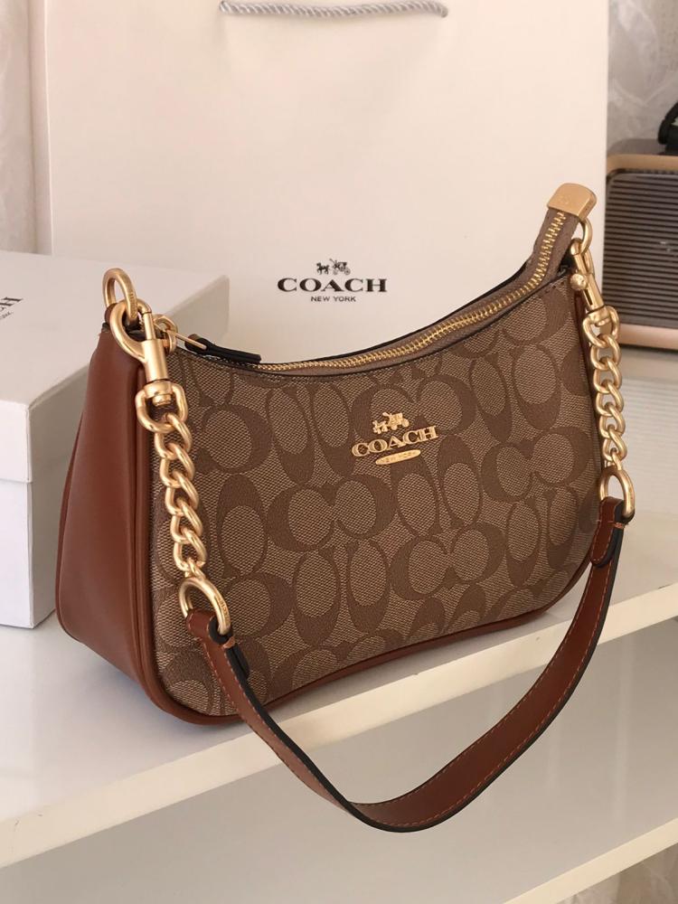 حقيبة كوتش مستر الأنيقة بلون بني- تصميم فاخر وأناقة لا مثيل لها