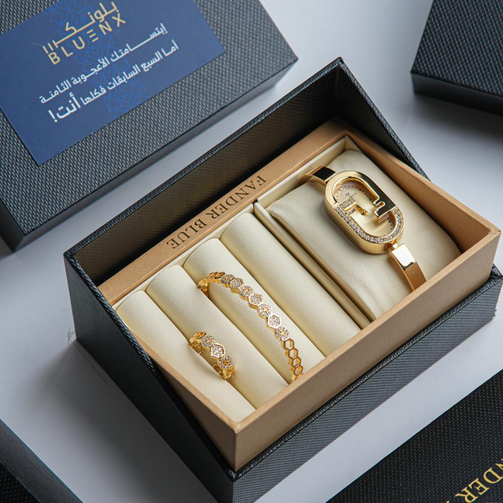طقم نسائي بسير ستيل بلون الذهبي مع أسواره و خاتم و الميناء الذهبي