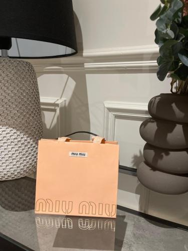 كيس Miu Miu