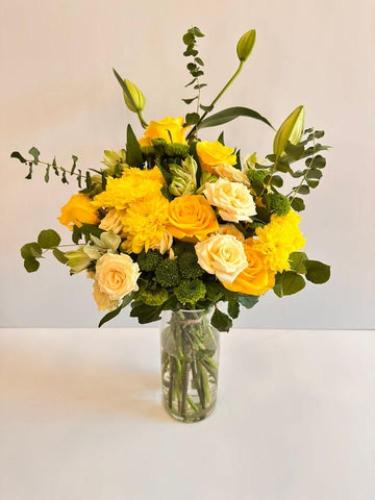 Golden GLow flowers Arrangement تنسيق الاصفر المتأ...