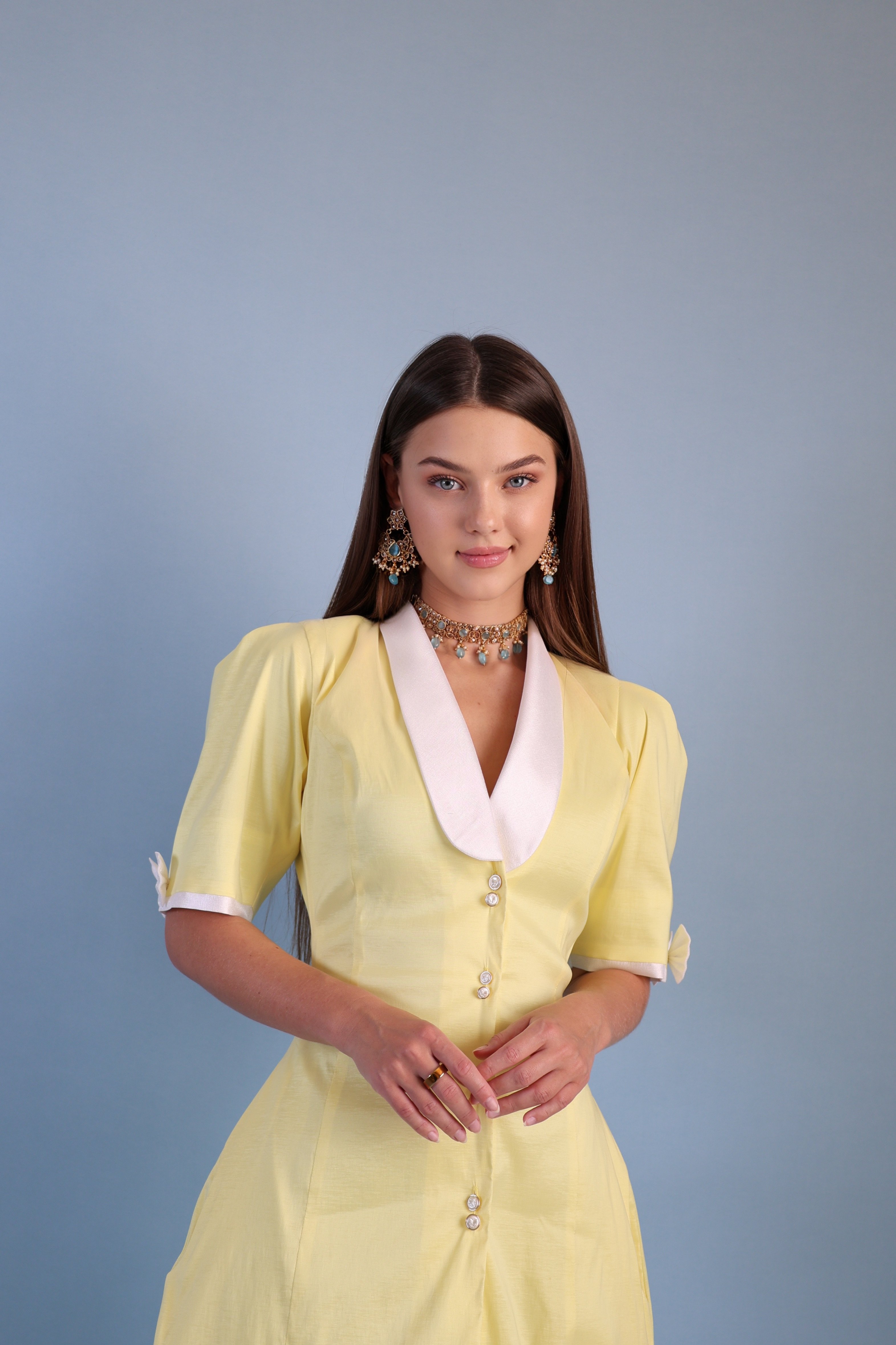 A dress with A distinctive color made of chiffon fabric with elegant feminine details