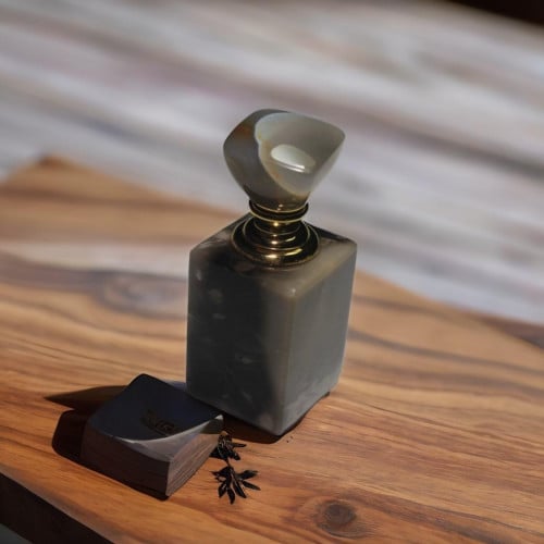 ربع تولة من الأحجار الطبيعية مع دهن العود الفاخر