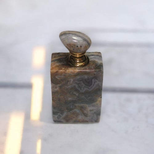 ربع تولة من الأحجار الطبيعية مع دهن العود الفاخر