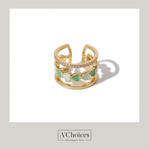 خاتم مصنوع من الفولاذ المقاوم للصدأ مطلي بالذهب مع الزيركون باللون الأخضر