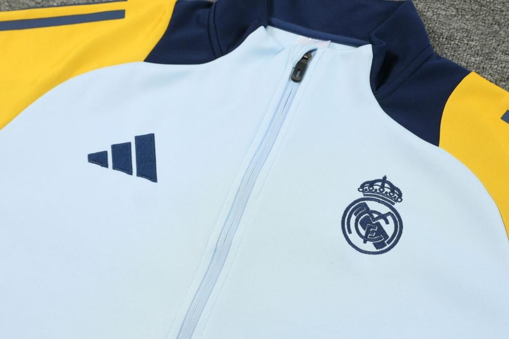 طقم تدريبات ريال مدريد شتوي البرتقالي