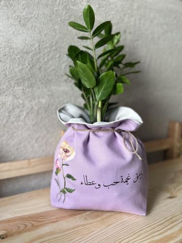تصم روز بعبارة ( دمتي غيمة حب وعطاء)