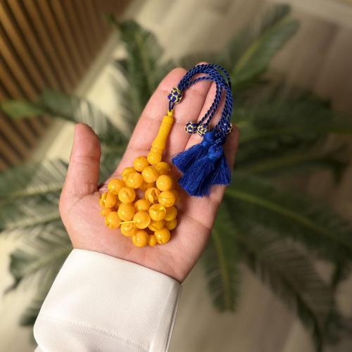 سبحة تراب كهرمان - اصفر كركوشة زرقاء